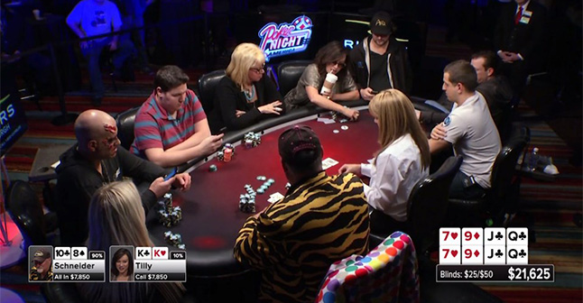Greg Mueller (dressed as a zombie at the table’s left) reading the negative attacks being shared online about Phil Hellmuth.