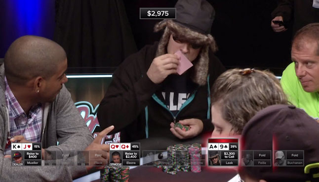 Phil Laak kisses his cards goodbye